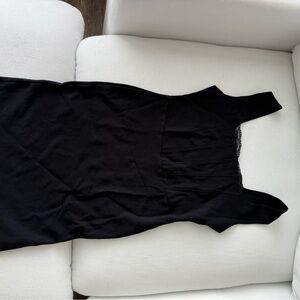 Sexy bodycon mini dress size M with thick stretchy fabric. Sleeveless Dress.